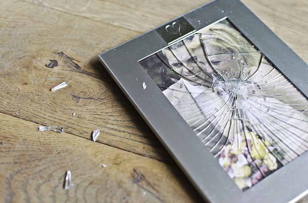 Wedding picture frame broken on floor