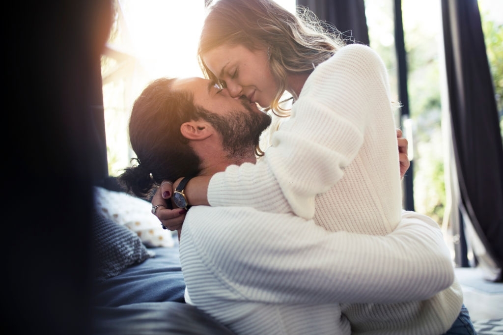 Romantic couple at home share tenderness